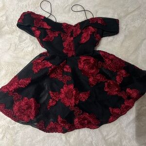One of a kind - purchased abroad 
Elegant Black and Red Floral Dress